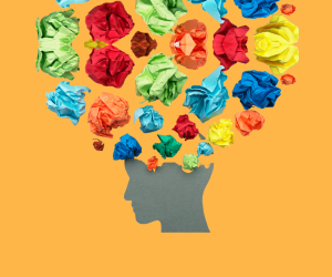 Image of a head silhouette with colorful crumbled papers raising above it