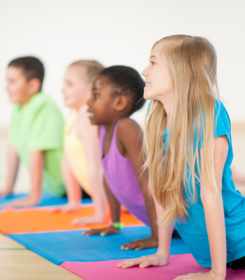 four children in yoga poses