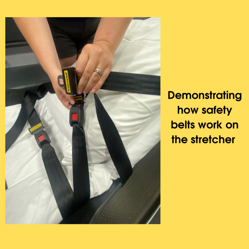 Demonstrating how safety belts work 
