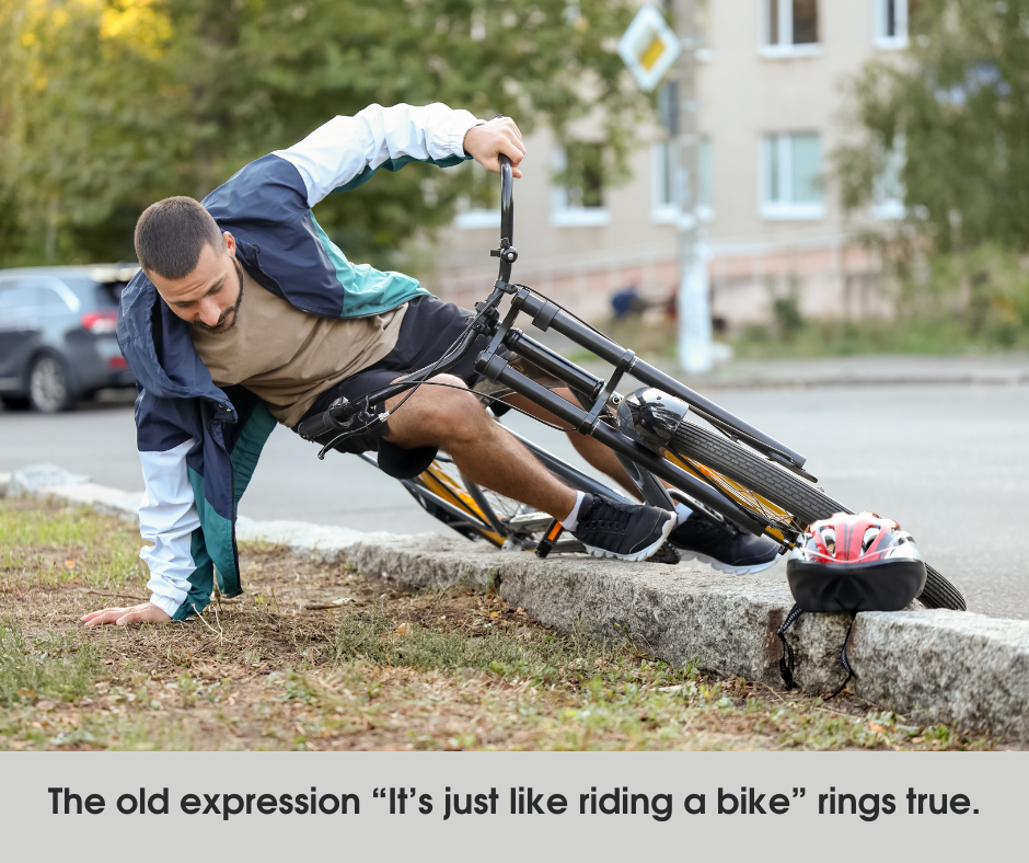 Man falling off a bicycle 