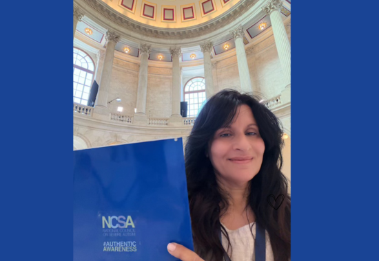 Chris holding a NCSA folder at Capitol Hill
